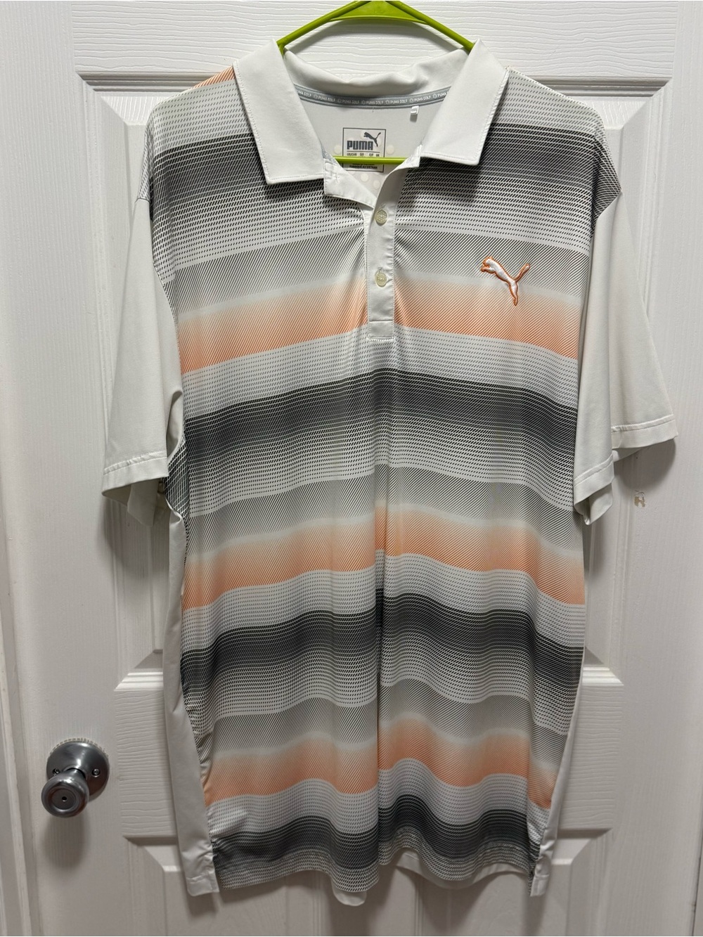 Puma Men’s White Polo with Orange and Gray Stripe Detail
